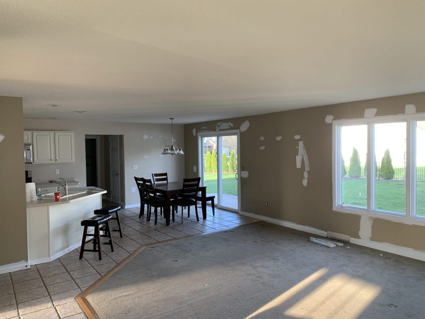 Kitchen entry and dining area — before