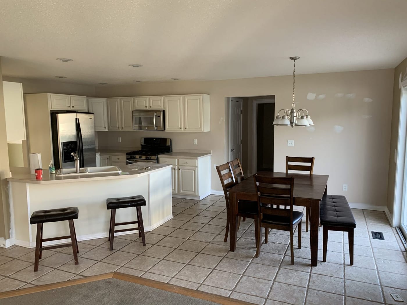 Island and dining area — before