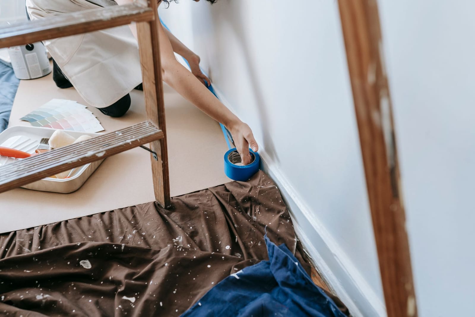 Hand-brushed interior trim and a painted six-panel door